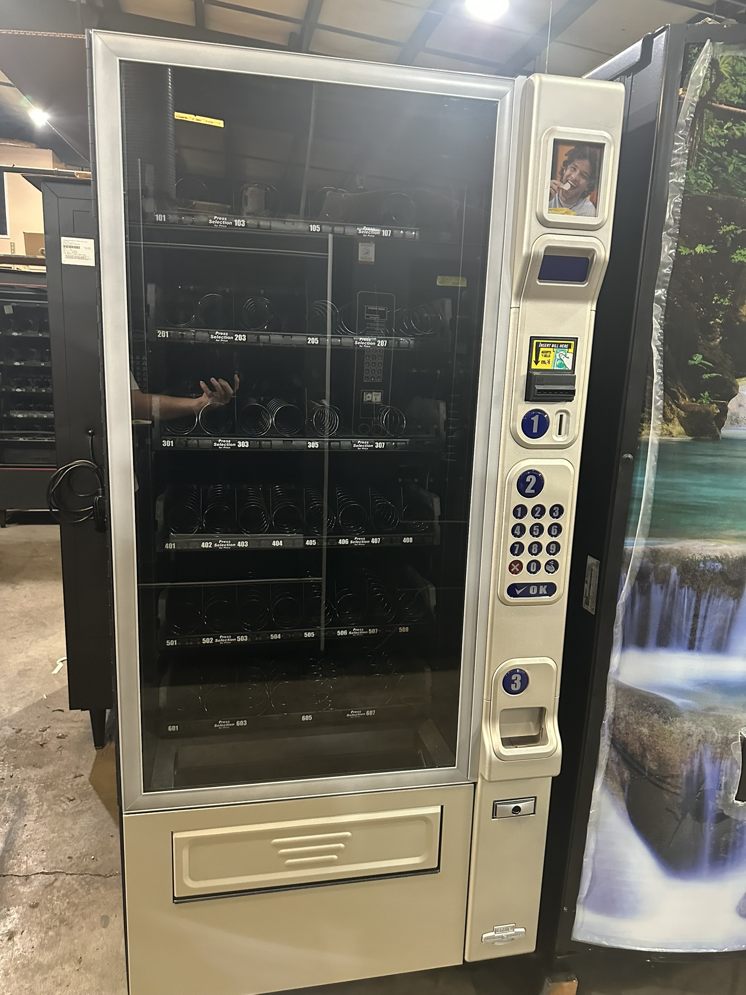 National Vendors 180 - 4 Wide Snack with rebuilt bill acceptor and changer. Cleaned up and checked out machine. $2,995.00